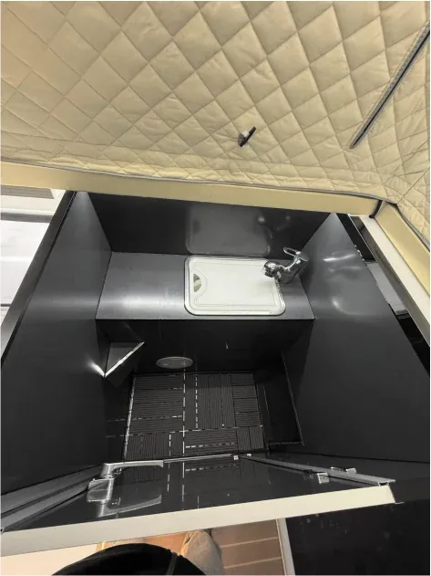 Camper bathroom module with sink and mirror